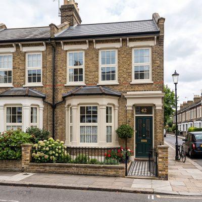 Flush sash uPVC windows on a traditional Victorian home, blending heritage style with modern performance.