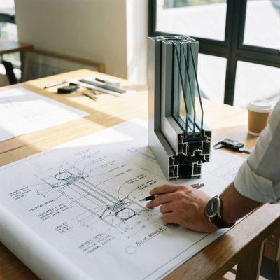 Architect_reviewing_blueprint