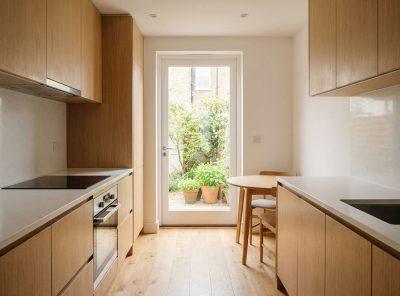 Kitchen opening onto courtyard garden