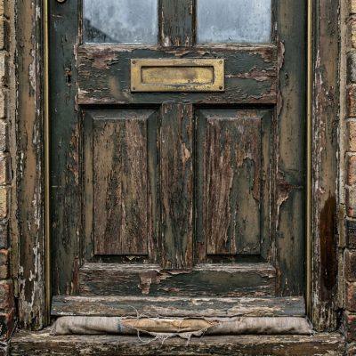 Ageing wooden front door
