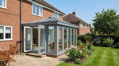 Conservatory attached to brick house